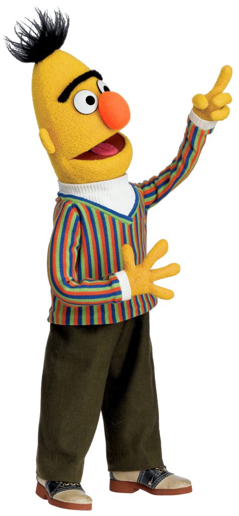Bert pointing, full body, profile view.